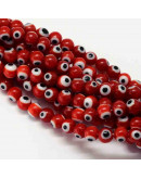 Ojo turco. Esfera. Color rojo. 6 milímetros diámetro. 1 mm perforación. 65 uds hilo (aprox.) Ojo turco. Esfera. Color rojo. 6 milímetros diámetro. 1 mm perforación. 65 uds hilo (aprox.)