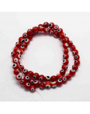 Ojo turco. Esfera. Color rojo. 6 milímetros diámetro. 1 mm perforación. 65 uds hilo (aprox.) Ojo turco. Esfera. Color rojo. 6 milímetros diámetro. 1 mm perforación. 65 uds hilo (aprox.)
