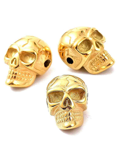 Calavera (2). Acero inoxidable. Color dorado. 14x9,5x9 milímetros. 1,6 mm perforación. 1 unidad.