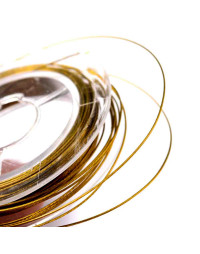 Tiger Tail. Hilo de nylon recubierto de acero. DARK GOLDEN. 0,45 mm grosor. 10 metros. 1 carrete