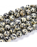 Jásper Dálmata. 12 mm diámetro. 1,5 mm perforación. 32 unidades hilo (aproximado) Jásper Dálmata. 12 mm diámetro. 1,5 mm perforación. 32 unidades hilo (aproximado)