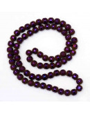 Opaco y brillante. Púrpura plateado. 4,5 milímetros. 1 mm perforación. 100 unidades (aproximado).