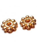 Disco. Aleación de cobre. Color dorado. 5x1,5 milímetros. 1 mm perforación. 50 uds. aproximado.