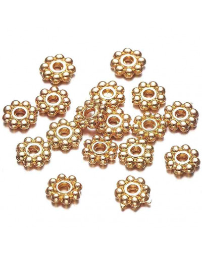 Disco. Aleación de cobre. Color dorado. 5x1,5 milímetros. 1 mm perforación. 50 uds. aproximado.