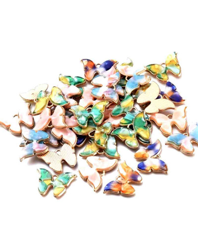 Mariposas (2). Aleación de cobre. Varios colores. 15x22x3 milímetros. 1,8 mm perforación. 2 unidades