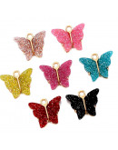 Mariposas (3). Aleación de cobre. Varios colores brillantina. 14x16 mm. 1,6 mm perforación. 2 uds. Mariposas (3). Aleación de cobre. Varios colores brillantina. 14x16 mm. 1,6 mm perforación. 2 uds.