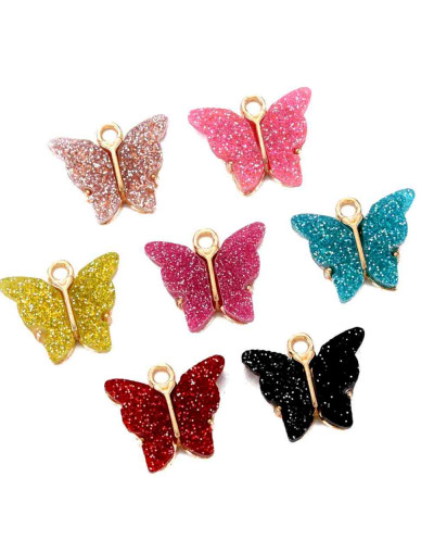 Mariposas (3). Aleación de cobre. Varios colores brillantina. 14x16 mm. 1,6 mm perforación. 2 uds.