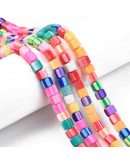 Cubo. Color arcoiris. 6x6x6 milímetros. 1,4 mm perforación. 60 unidades hilo (aproximado).