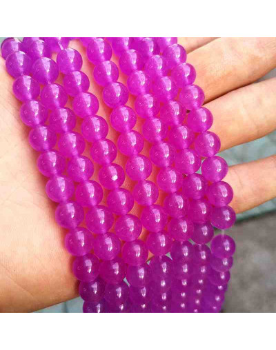 Calcedonia. Magenta. 10 milímetros diámetro. 1 mm perforación. 35 unidades hilo (aproximado).