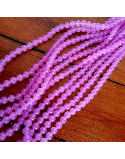 Calcedonia. Magenta. 10 milímetros diámetro. 1 mm perforación. 35 unidades hilo (aproximado).