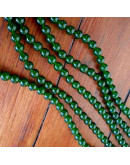 Calcedonia. Dark Green. 06 milímetros diámetro. 1 mm perforación. 60 unidades hilo (aproximado).