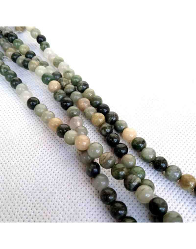 Natural Green. 06 milímetros diámetro. 1 mm perforación. 60 unidades hilo (aproximado).