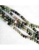 Natural Green. 06 milímetros diámetro. 1 mm perforación. 60 unidades hilo (aproximado).