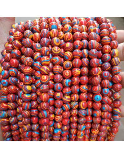 Malaquita sintética. Tonos rojos. 04 mm diámetro. 1 mm perforación. 90 uds hilo (aproximado).