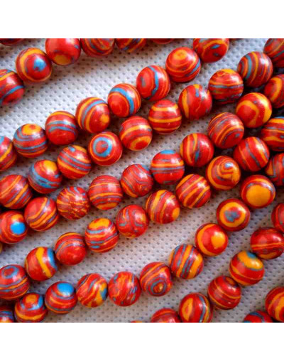 Malaquita sintética. Tonos rojos. 04 mm diámetro. 1 mm perforación. 90 uds hilo (aproximado).