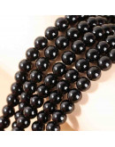 Obsidiana negra. 06 milímetros diámetro. 1 mm perforación. 60 unidades hilo (aproximado). Obsidiana negra. 06 milímetros diámetro. 1 mm perforación. 60 unidades hilo (aproximado).