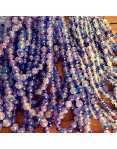 Calcedonia. Multicolor (2). 06 milímetros diámetro. 1 mm perforación. 60 unidades hilo (aproximado).