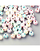 Religión: Cruz varios colores. Esfera blanca. 8 mm diámetro. 2 mm perforación. 50 uds aproximado.