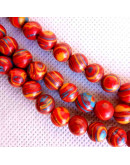 Malaquita sintética. Tonos rojos. 08 mm diámetro. 1 mm perforación. 45 uds hilo (aproximado).