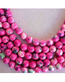 Jásper sintético. Tonos rosados. 08 mm diámetro. 1 mm perforación. 45 uds hilo (aproximado). Jásper sintético. Tonos rosados. 08 mm diámetro. 1 mm perforación. 45 uds hilo (aproximado).