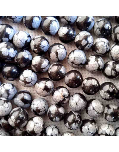 Obsidiana Nevada. 08 milímetros diámetro. 1 mm perforación. 45 unidades hilo (aproximado).