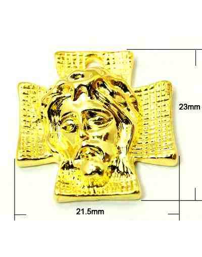 Cruz+Rostro. Aleación de cobre. Color dorado. 23x21x6 milímetros. 2 mm perforación. 4 unidades.