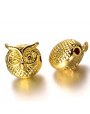 Buhos. Aleación cobre. Color dorado. 11x11x9 milímetros. 1,5 mm perforación. 2 unidades.