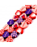 Corazones. 9~10x9,5~10,5x4,5 milímetros. 1,5 mm perforación. 40 unidades hilo (aproximado).