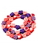 Corazones. 9~10x9,5~10,5x4,5 milímetros. 1,5 mm perforación. 40 unidades hilo (aproximado).