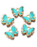 Mariposas (4). Aleación de cobre y esmalte. DARK TURQUOISE. 16x13x2 mm. 2 mm perforación. 4 uds. Mariposas (4). Aleación de cobre y esmalte. DARK TURQUOISE. 16x13x2 mm. 2 mm perforación. 4 uds.