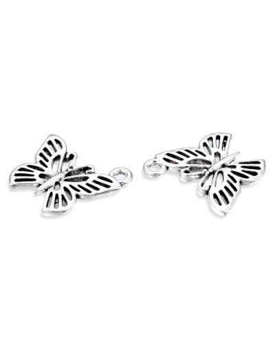 Mariposa. Aleación de cobre. Color plata antigua. 18x19x2 milímetros. 1,8 mm perforación. 5 unidades