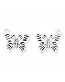 Mariposa. Aleación de cobre. Color plata antigua. 18x19x2 milímetros. 1,8 mm perforación. 5 unidades Mariposa. Aleación de cobre. Color plata antigua. 18x19x2 milímetros. 1,8 mm perforación. 5 unidades