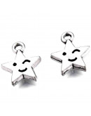 Estrella+Cara. Aleación de cobre. Color plata antigua. 14x12x2,5 mm. 1,8 mm perforación. 10 unidades Estrella+Cara. Aleación de cobre. Color plata antigua. 14x12x2,5 mm. 1,8 mm perforación. 10 unidades