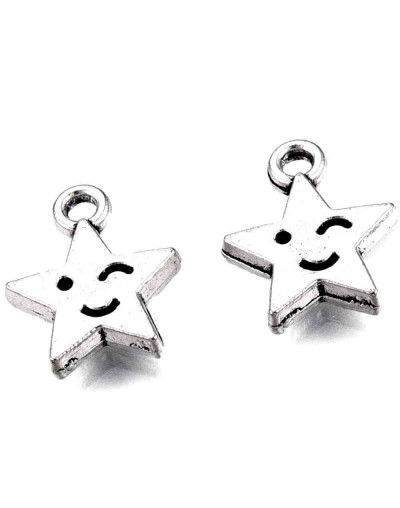 Estrella+Cara. Aleación de cobre. Color plata antigua. 14x12x2,5 mm. 1,8 mm perforación. 10 unidades