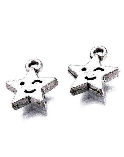 Estrella+Cara. Aleación de cobre. Color plata antigua. 14x12x2,5 mm. 1,8 mm perforación. 10 unidades