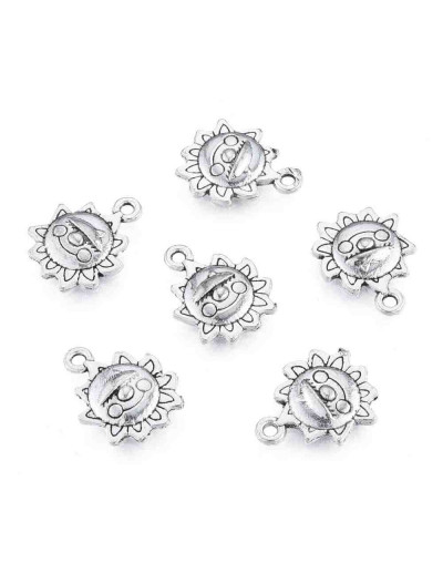 Sol+Sonrisa. Aleación de cobre. Color plata antigua. 15x12x2,5 mm. 1,6 mm perforación. 10 unidades