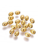 Barril. Aleación de cobre. Color dorado. 4x5 milímetros. 1 mm perforación. 20 unidades.