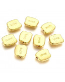 LOVE (2). Aleacion de cobre. Color dorado. 12,5x10,5x3 milímetros. 2 mm perforación. 10 unidades.