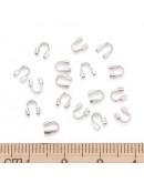 Wire guardians. Aleación de cobre. Color plateado. 4,5x4x1 mm. 0,50 mm perforación. 50 uds (aprox).