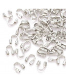 Wire guardians. Aleación de cobre. Color plateado. 4,5x4x1 mm. 0,50 mm perforación. 50 uds (aprox).