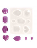 Moldes de silicona. Para resina. 7 formas para dijes. 80x90x8 milímetros. 1 mme perforación. 1 ud. Moldes de silicona. Para resina. 7 formas para dijes. 80x90x8 milímetros. 1 mme perforación. 1 ud.