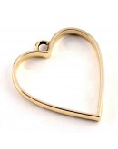 Corazón. Base para resina. Aleación de cobre. Color dorado. 34x30x3,7 mm. 3 mm perforación. 1 ud.