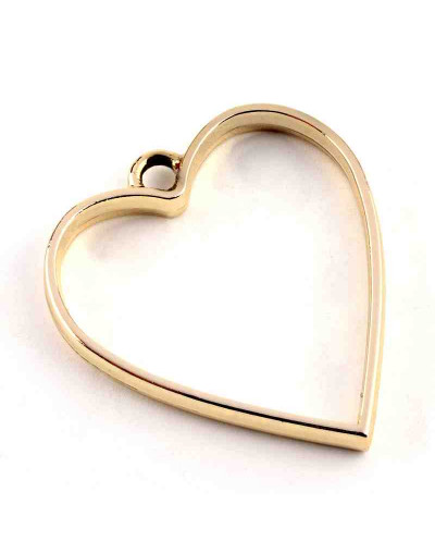 Corazón. Base para resina. Aleación de cobre. Color dorado. 34x30x3,7 mm. 3 mm perforación. 1 ud.