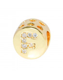 Letra "F". Moneda. Aleación+Zirconia. 7,3 milímetros diámetro. 3,2 mm perforación. 1 unidad. Letra "F". Moneda. Aleación+Zirconia. 7,3 milímetros diámetro. 3,2 mm perforación. 1 unidad.