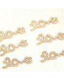 Love. Aleación+Zirconia. Baño 18KGold. 27x6 milímetros. 2 mm perforación. 1 unidad. Love. Aleación+Zirconia. Baño 18KGold. 27x6 milímetros. 2 mm perforación. 1 unidad.