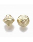 Bi-cono. Color Ligth Gold. 7x6 milímetros. 1,5 mm perforación. 50 unidades aproximado.