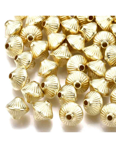 Bi-cono. Color Ligth Gold. 7x6 milímetros. 1,5 mm perforación. 50 unidades aproximado.