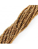 Rondelle faceteado. 2x1,5 mm. GOLDEN PLATED. 0,6 mm perforación. 220 uds hilo (aproximado).