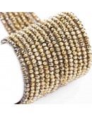 Rondelle faceteado. 2x1,5 mm. LIGHT GOLD PLATED. 0,6 mm perforación. 220 uds hilo (aproximado).