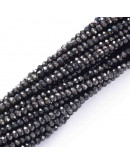 Rondelle faceteado. 2x1,5 mm. GUNMETAL PLATED. 0,6 mm perforación. 220 uds hilo (aproximado).